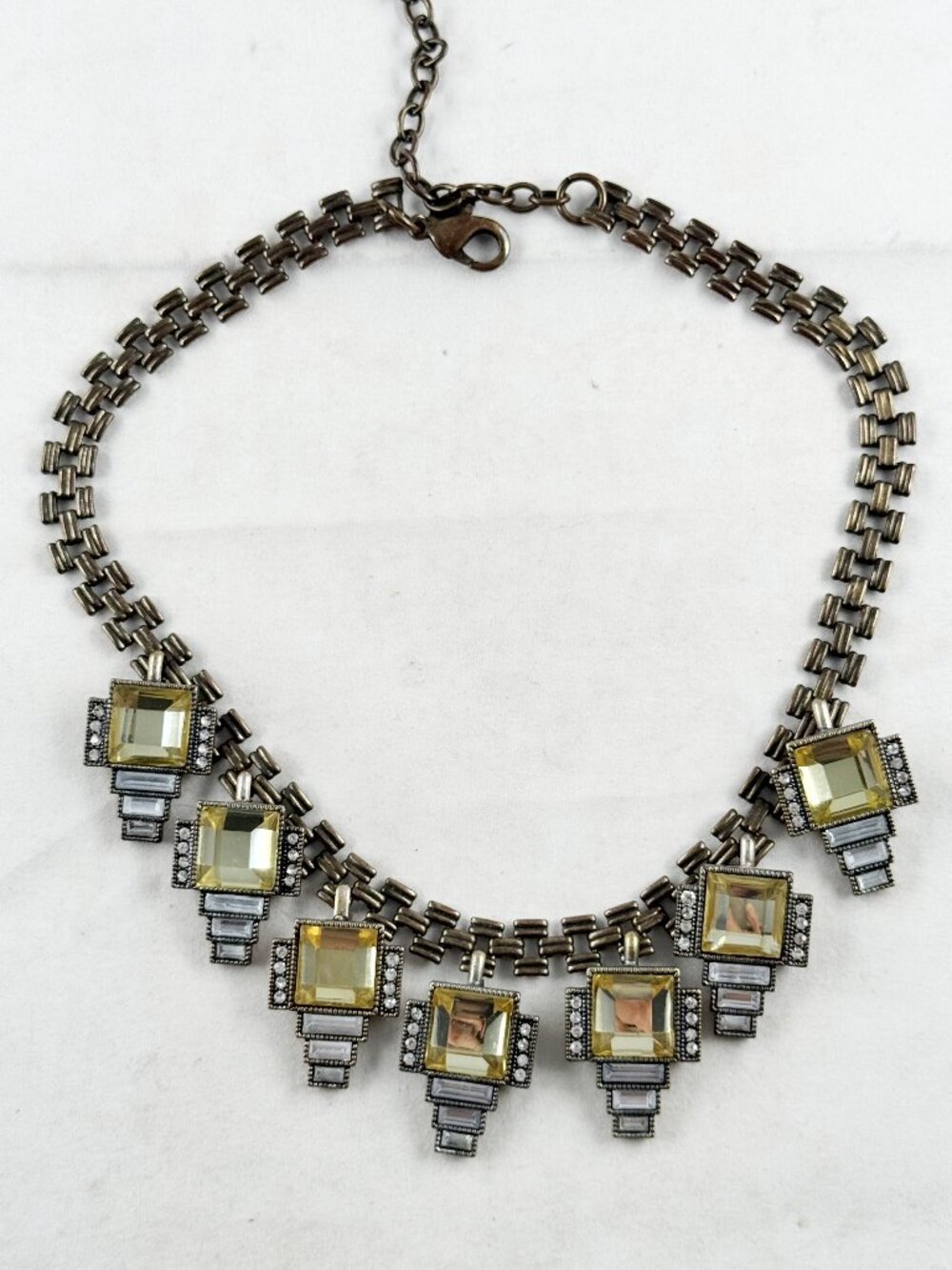 Bronze colored necklace Art Deco dangle charms crystals, signed Leslie Danzis